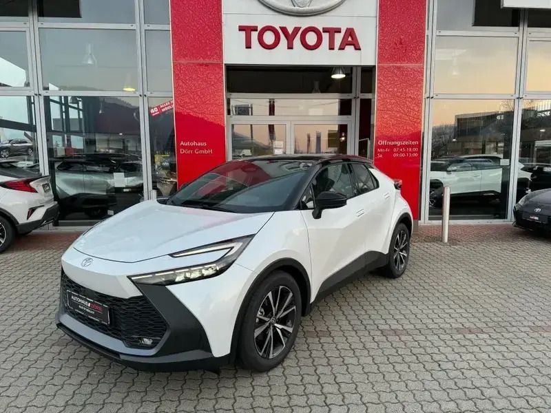 Platinumweiss perleffekt/schwa Gebraucht 2023 Toyota C-HR Team SUV | 33.990 € - Bild 1/4