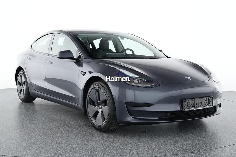 Grau Gebraucht 2021 Tesla Model 3 Standard Range Plus Limousine | 23.312 € (Superpreis) - Bild 1/4