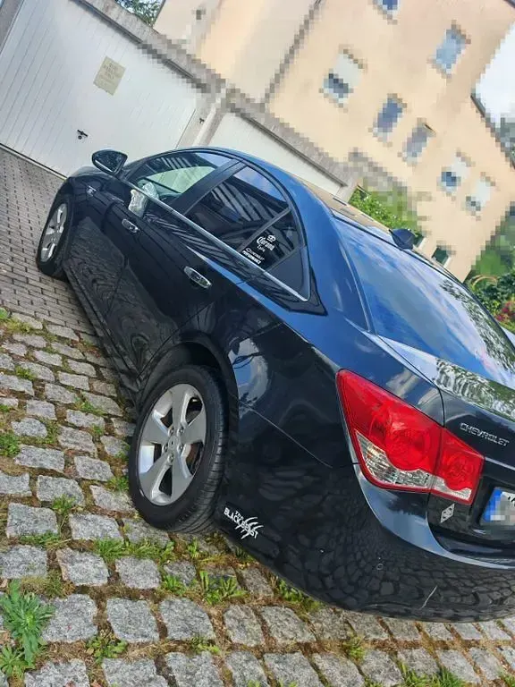 Gebraucht Chevrolet Cruze LT 163 PS (119 kW) 2011 Schwarz Limousine