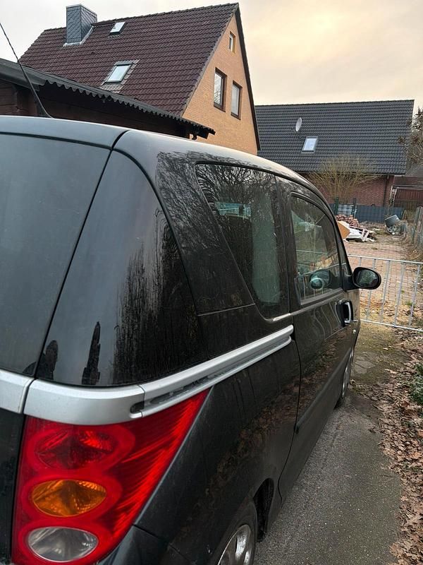 Gebraucht Peugeot 1007 75 PS (55 kW) 2009 Schwarz Van / Kleinbus