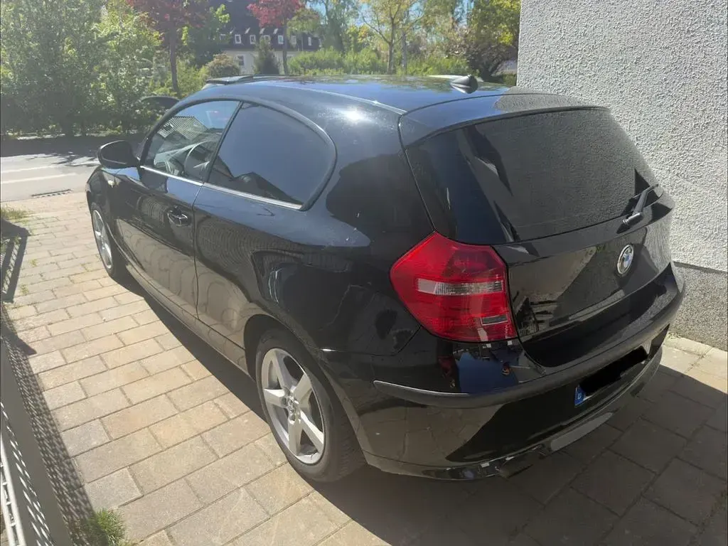 Gebraucht BMW 118 143 PS (105 kW) 2010 Schwarz Kleinwagen