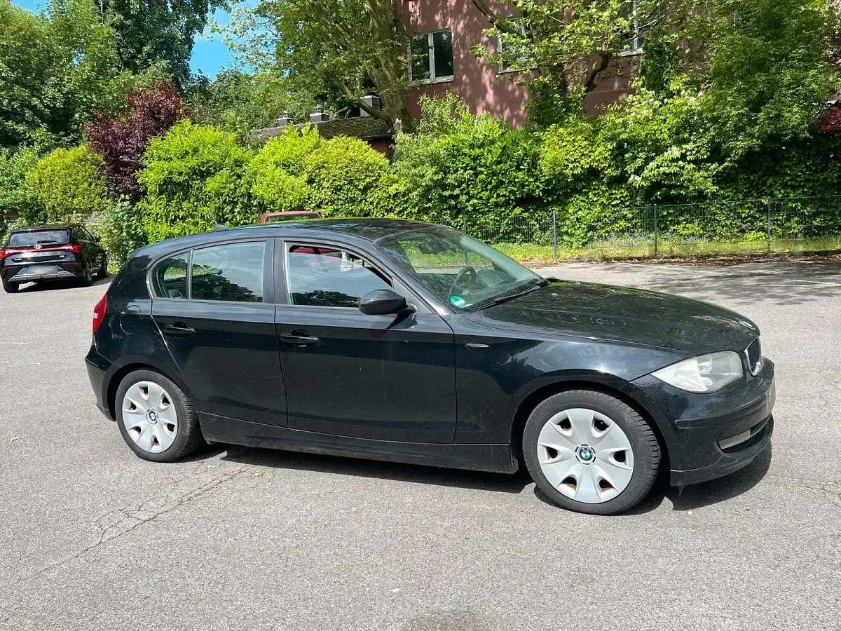 Gebraucht BMW 116 116 PS (85 kW) 2009 Schwarz Kleinwagen