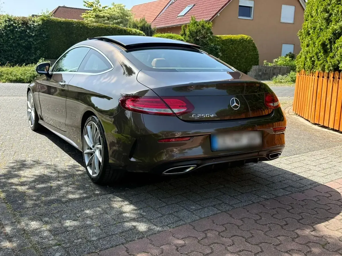 Gebraucht Mercedes C250 AMG line 204 PS (150 kW) 2016 Braun Coupé