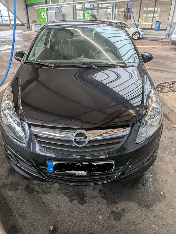 Używany Opel Corsa 101 KM (74 kW) 2011 Czarny Hatchback