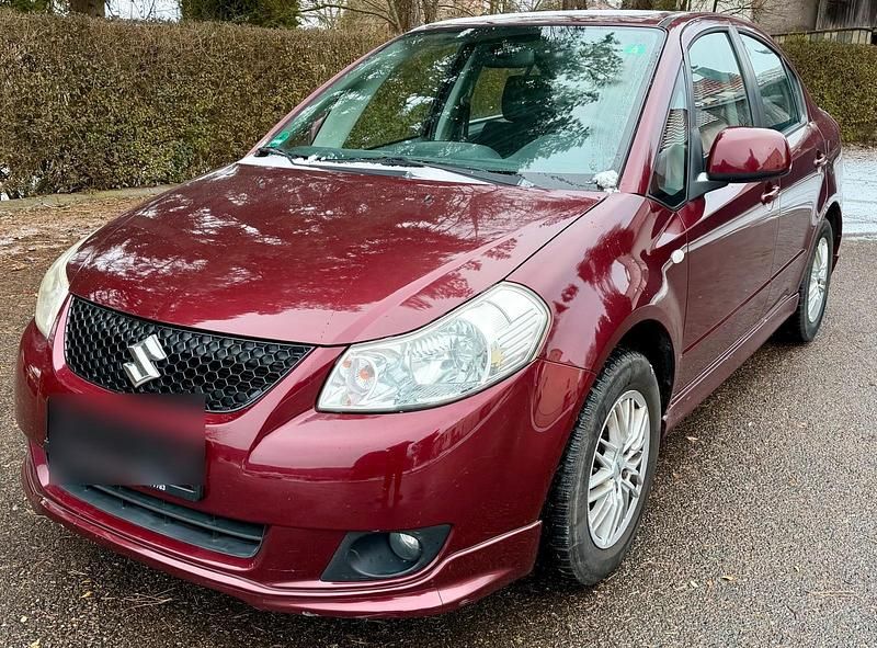 Rot Gebraucht 2008 Suzuki SX4 Limousine | 2.499 € - Bild 1/4