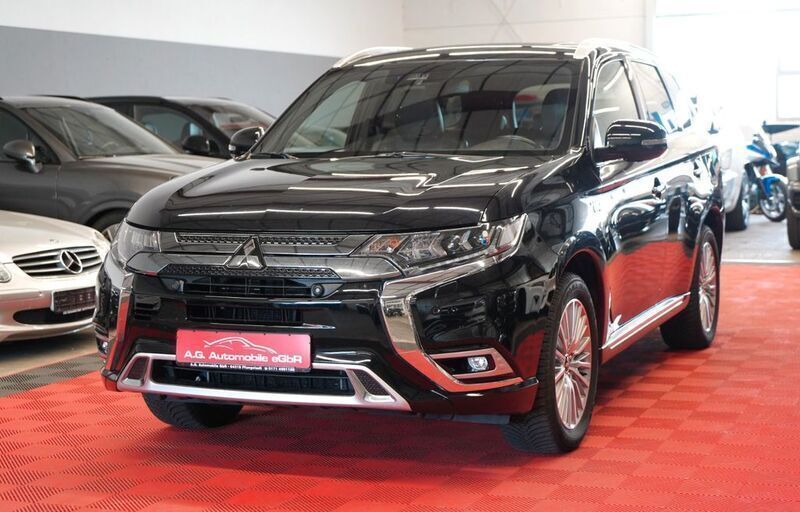 Schwarz Gebraucht 2018 Mitsubishi Outlander P-HEV Top SUV | 18.950 € (Fairer Preis) - Bild 1/4
