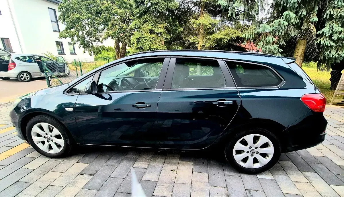 Gebraucht Opel Astra 120 PS (88 kW) 2015 Grün Kombi