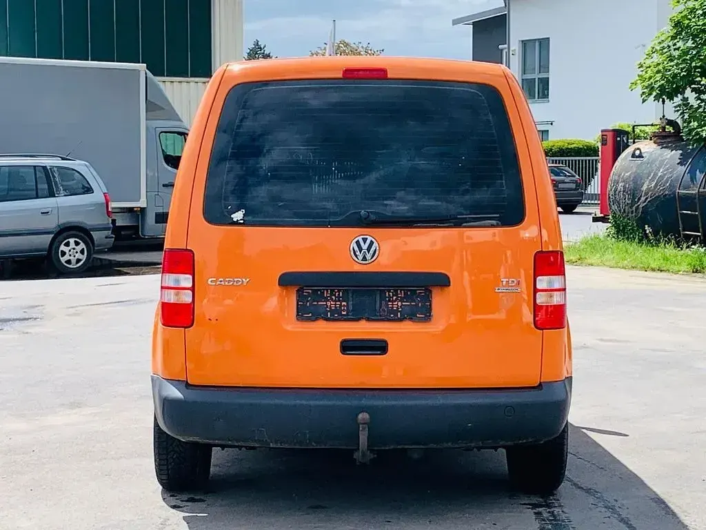 Gebraucht VW Caddy 102 PS (75 kW) 2011 Leuchtorange Van / Kleinbus
