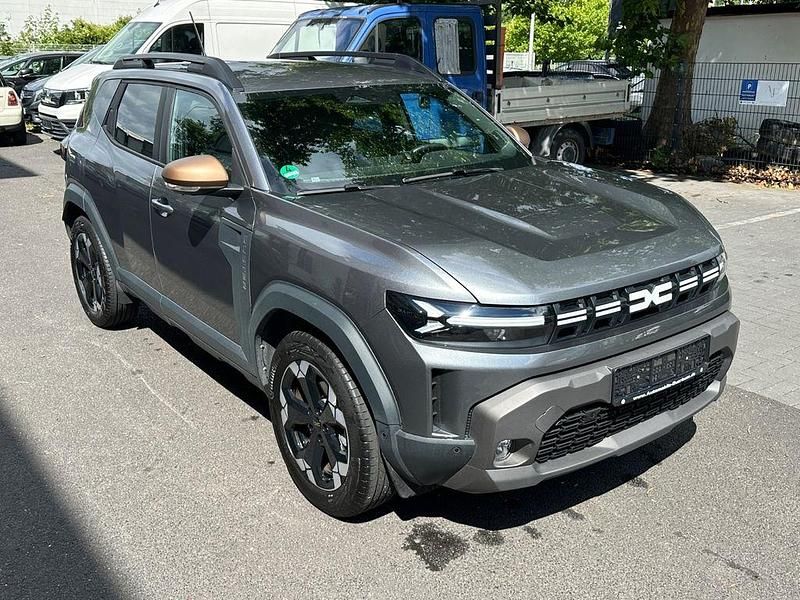 Grau Gebraucht 2024 Dacia Duster Extreme SUV | 23.500 € (Superpreis) - Bild 1/4