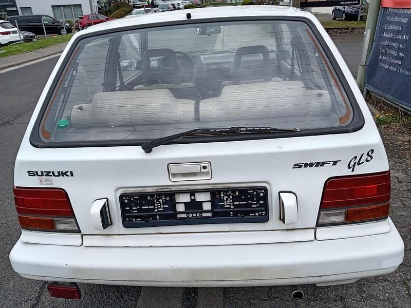 Gebraucht Suzuki Swift GLX 70 PS (51 kW) 1988 Weiß Kleinwagen