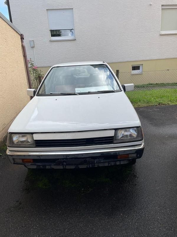 Weiß Gebraucht 1984 Mitsubishi Colt Limousine | 400 € - Bild 1/4