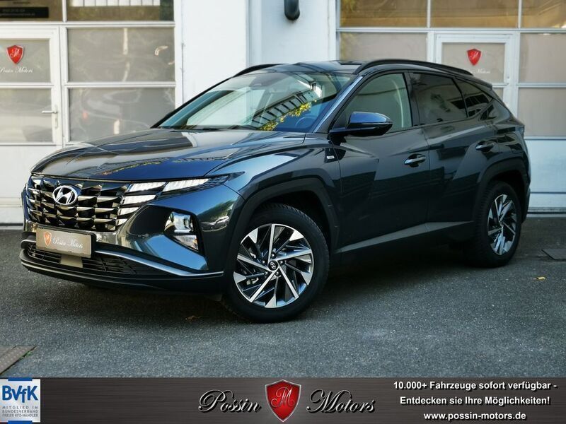Grau (amazon grey) Gebraucht 2023 Hyundai Tucson SUV | 29.390 € (Guter Preis) - Bild 1/4