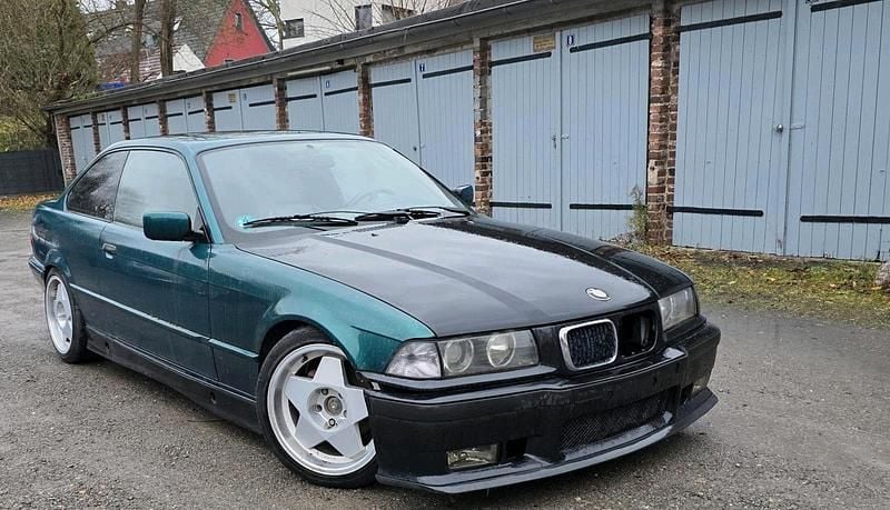 Second-hand BMW 320 Basis 150 CP (110 kW) 1992 Verde Coupe