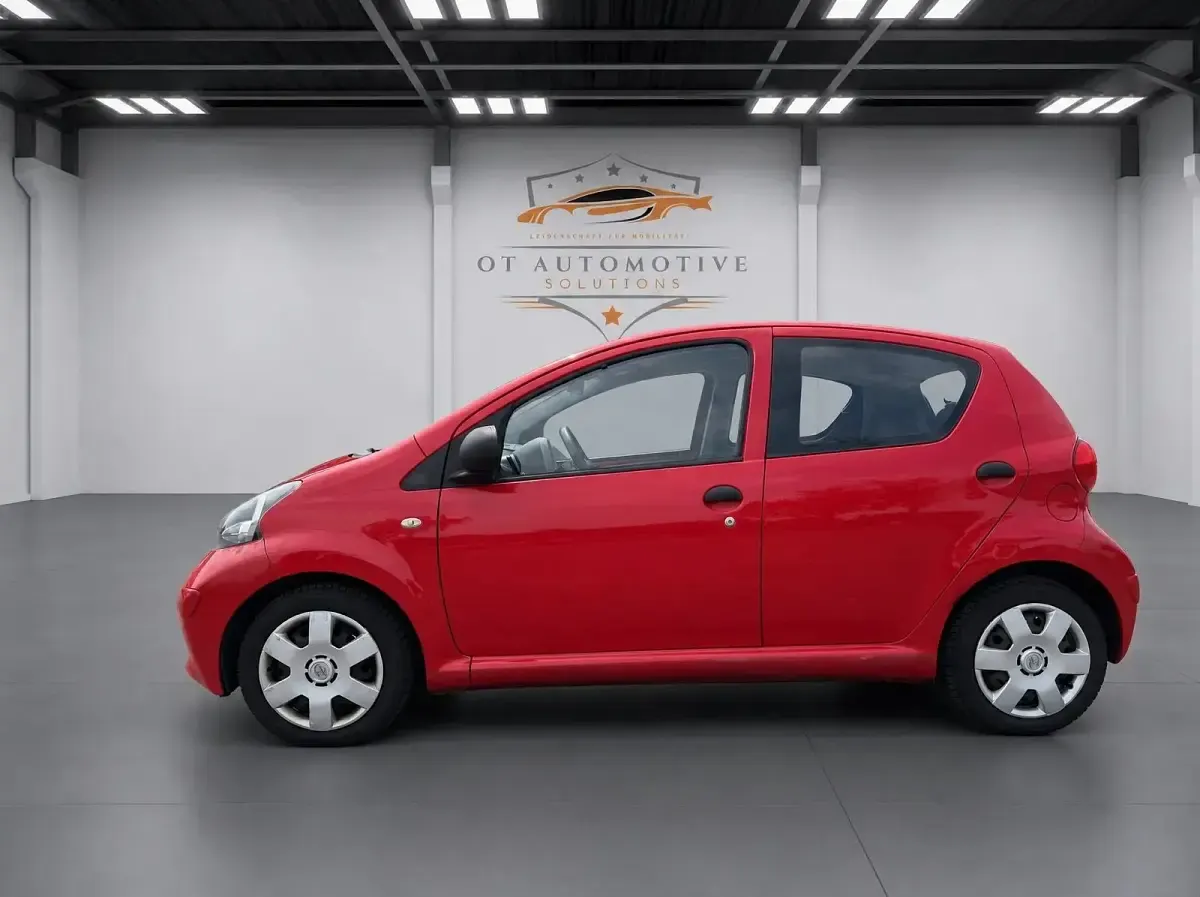 Gebraucht Toyota Aygo 68 PS (50 kW) 2007 Rot Kleinwagen