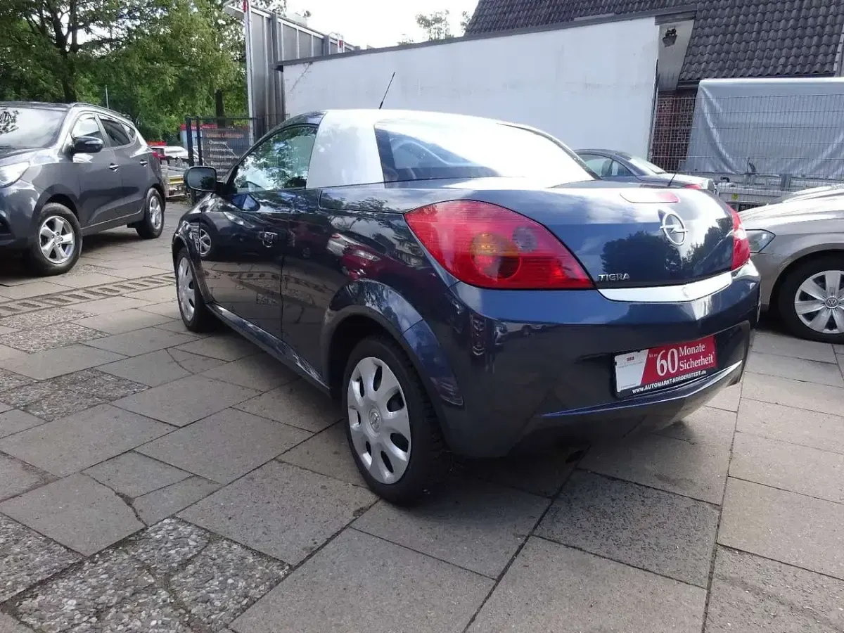 Gebraucht Opel Tigra Sport 90 PS (66 kW) 2007 Metro blue/metro Cabrio