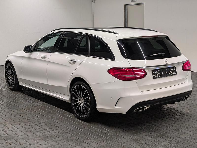 Gebraucht Mercedes C400 AMG line 333 PS (244 kW) 2018 Polarweiss Kombi