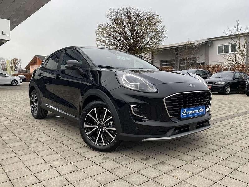 Agate black metallic Gebraucht 2022 Ford Puma Gen-E Titanium SUV | 16.290 € (Superpreis) - Bild 1/4