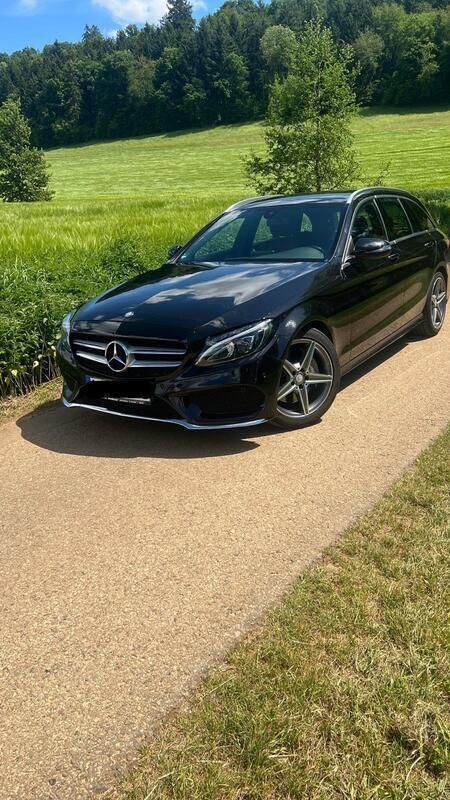 Schwarz Gebraucht 2015 Mercedes C250 AMG line Kombi | 14.490 € (Superpreis) - Bild 1/4