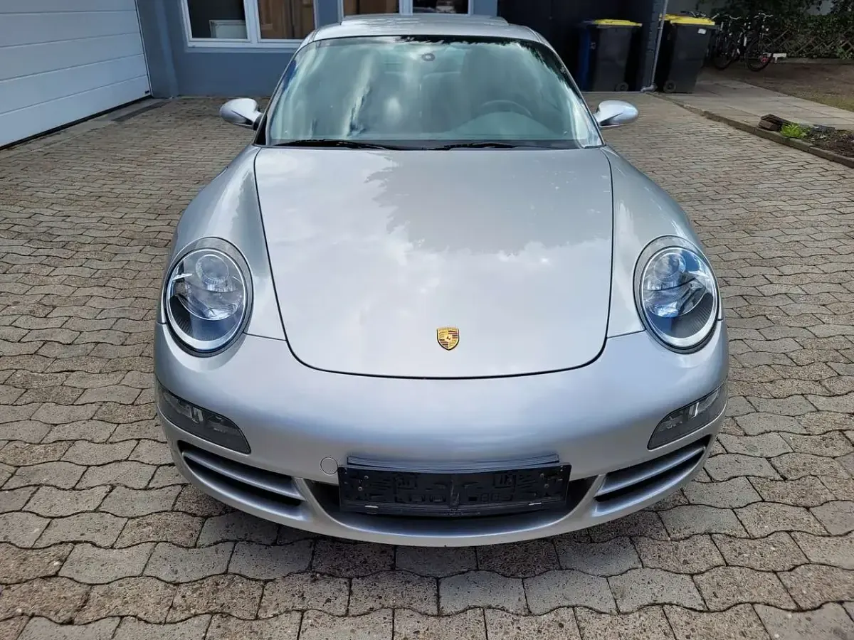 Gebraucht Porsche 911 Carrera 325 PS (239 kW) 2006 Arktissilbermetallic Coupé