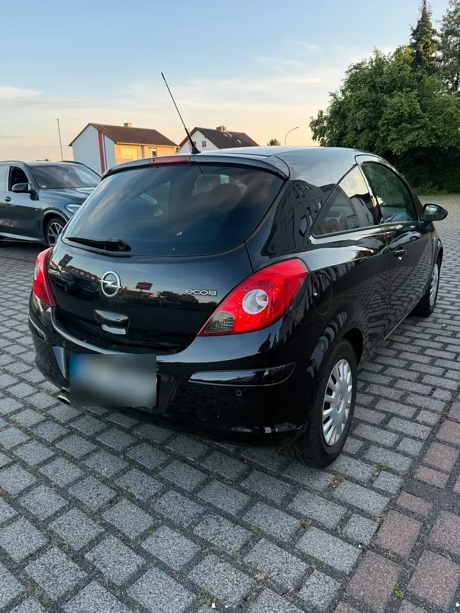 Gebraucht Opel Corsa 87 PS (63 kW) 2012 Schwarz Kleinwagen