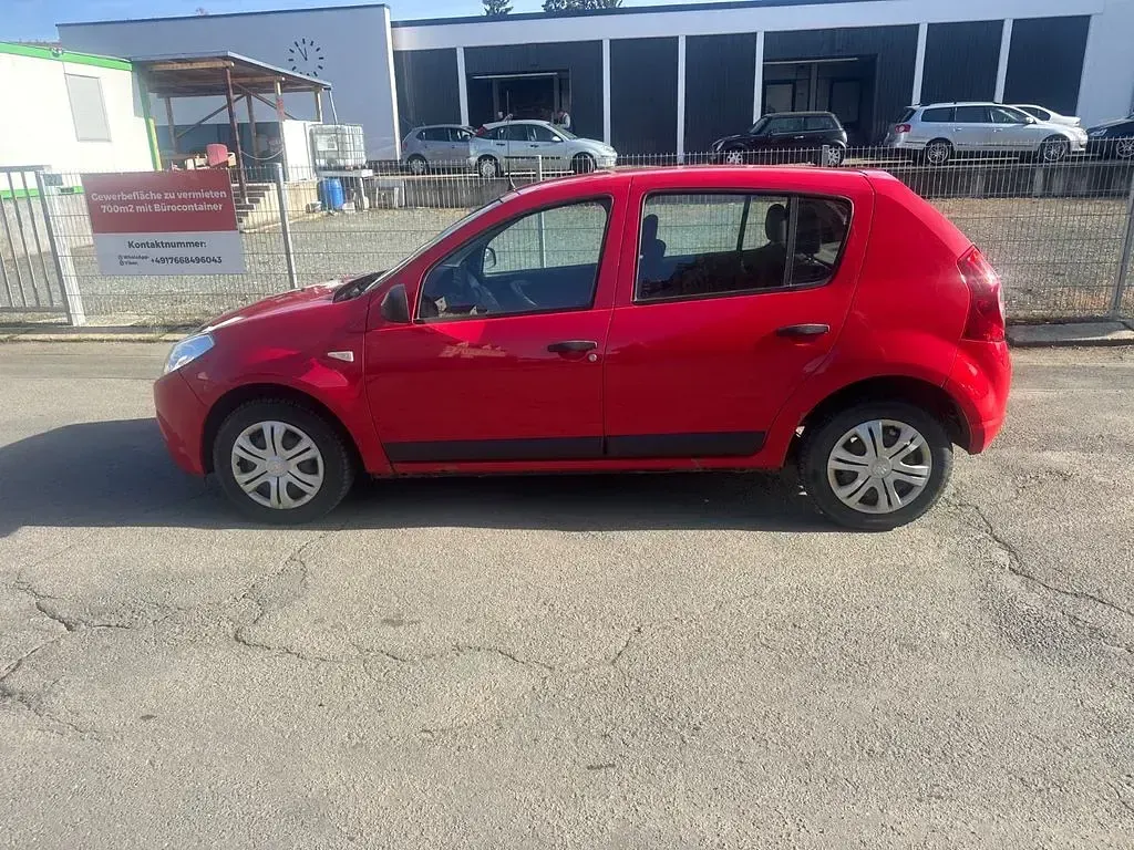 Second-hand Dacia Sandero 75 CP (55 kW) 2009 Roșu Berlinǎ