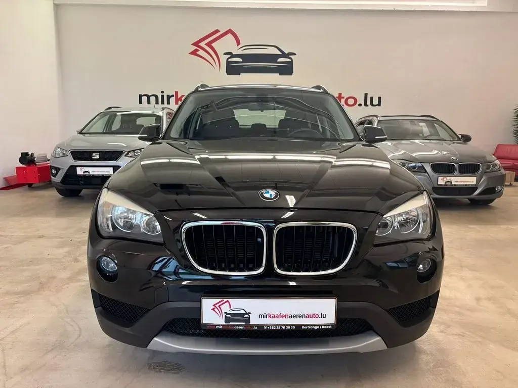 Second-hand BMW X1 150 CP (110 kW) 2014 Negru SUV