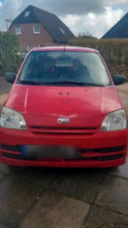 Gebraucht Daihatsu Cuore 58 PS (42 kW) 2006 Rot Kleinwagen