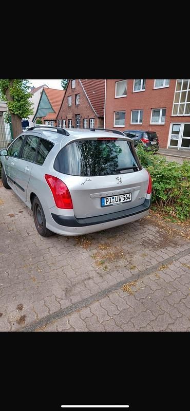 Grau Gebraucht 2009 Peugeot 308 Limousine | 1.200 € - Bild 1/4