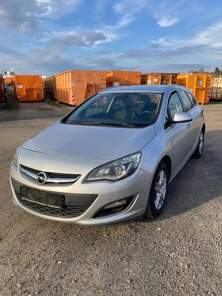 Second-hand Opel Astra 131 CP (96 kW) 2014 Argintiu Break