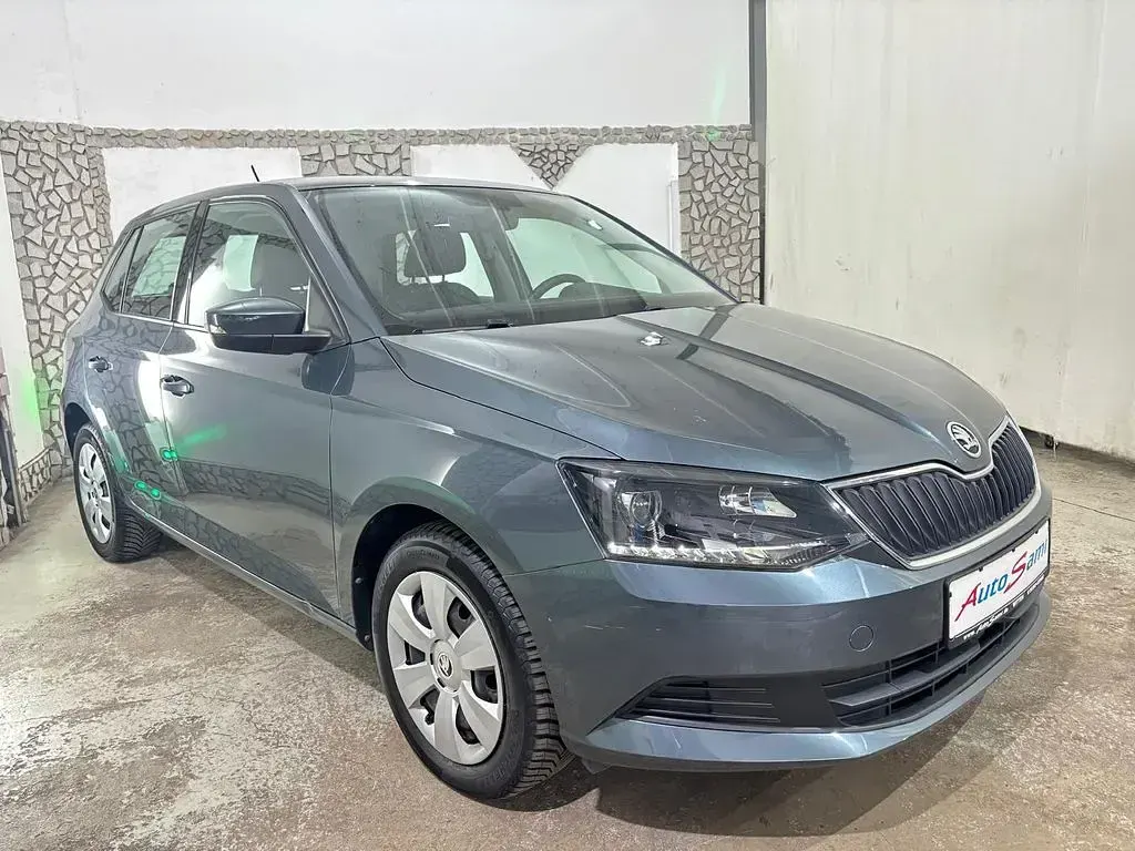 Używany Skoda Fabia 90 KM (66 kW) 2015 Szary Sedan/Limuzyna