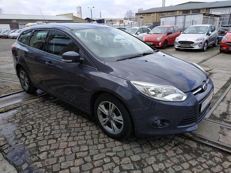 Gebraucht Ford Focus 125 PS (91 kW) 2014 Midnight skygrau Kombi
