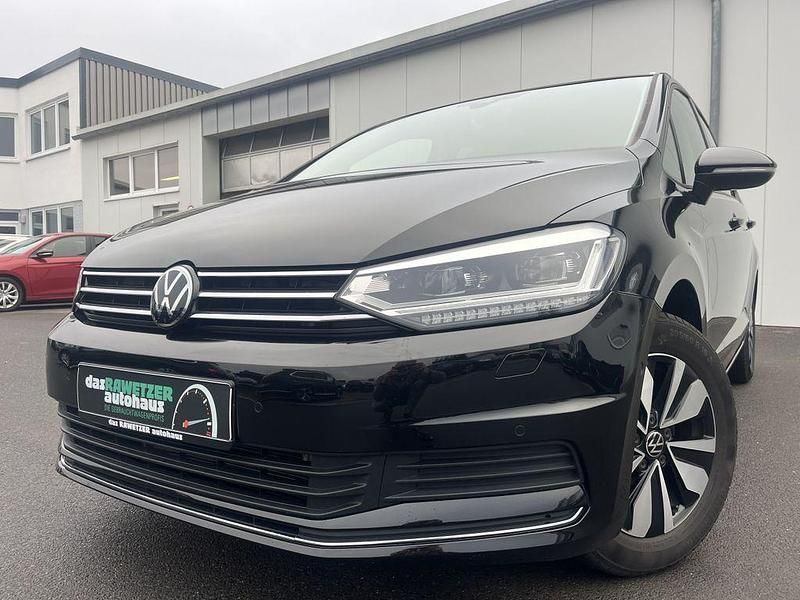 Grenadillschwarz Gebraucht 2025 VW Touran Goal Van / Kleinbus | 32.860 € (Fairer Preis) - Bild 1/4