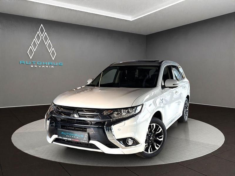Weiß Gebraucht 2017 Mitsubishi Outlander P-HEV Top SUV | 15.900 € (Fairer Preis) - Bild 1/4