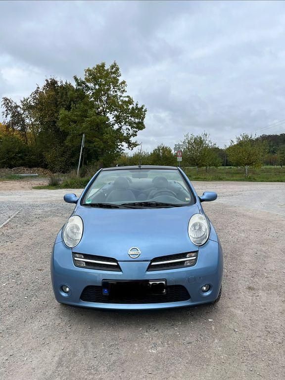 Blau Gebraucht 2007 Nissan Micra C+C Cabrio | 1.499 € (Superpreis) - Bild 1/4