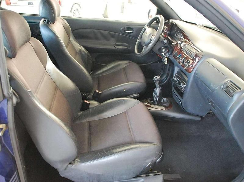 Gebraucht Ford Escort Cabriolet 90 PS (66 kW) 1996 Blau (metallic) Cabrio