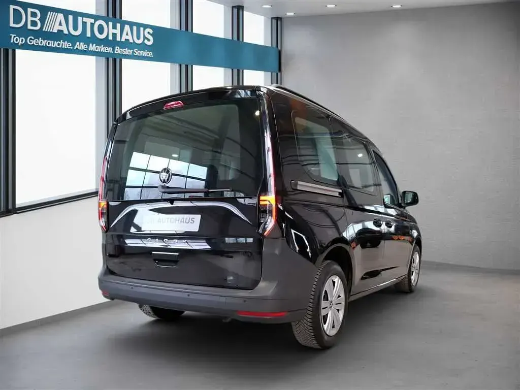 Second-hand VW Caddy 114 CP (83 kW) 2024 Negru Monovolum