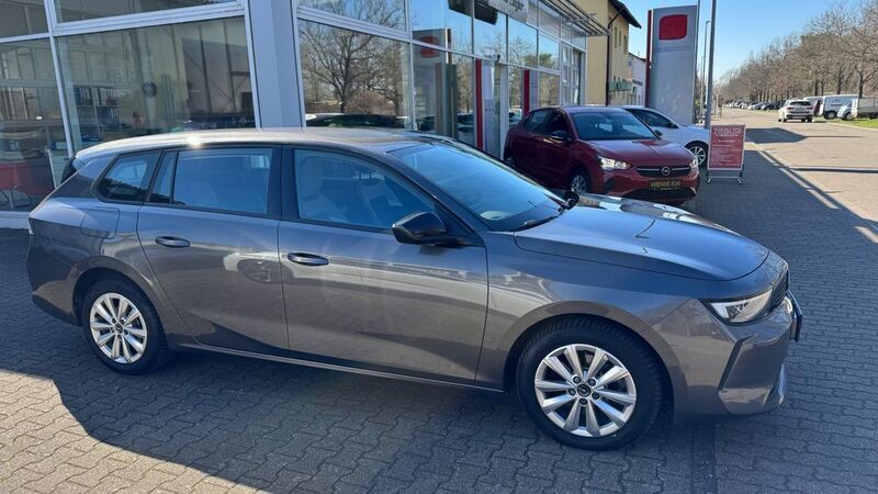 Grau Gebraucht 2023 Opel Astra Enjoy Kombi | 20.700 € (Fairer Preis) - Bild 1/4