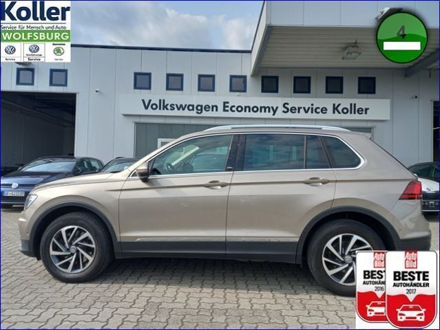 Beige Gebraucht 2018 VW Tiguan Sound SUV | 22.770 € (Superpreis) - Bild 1/4