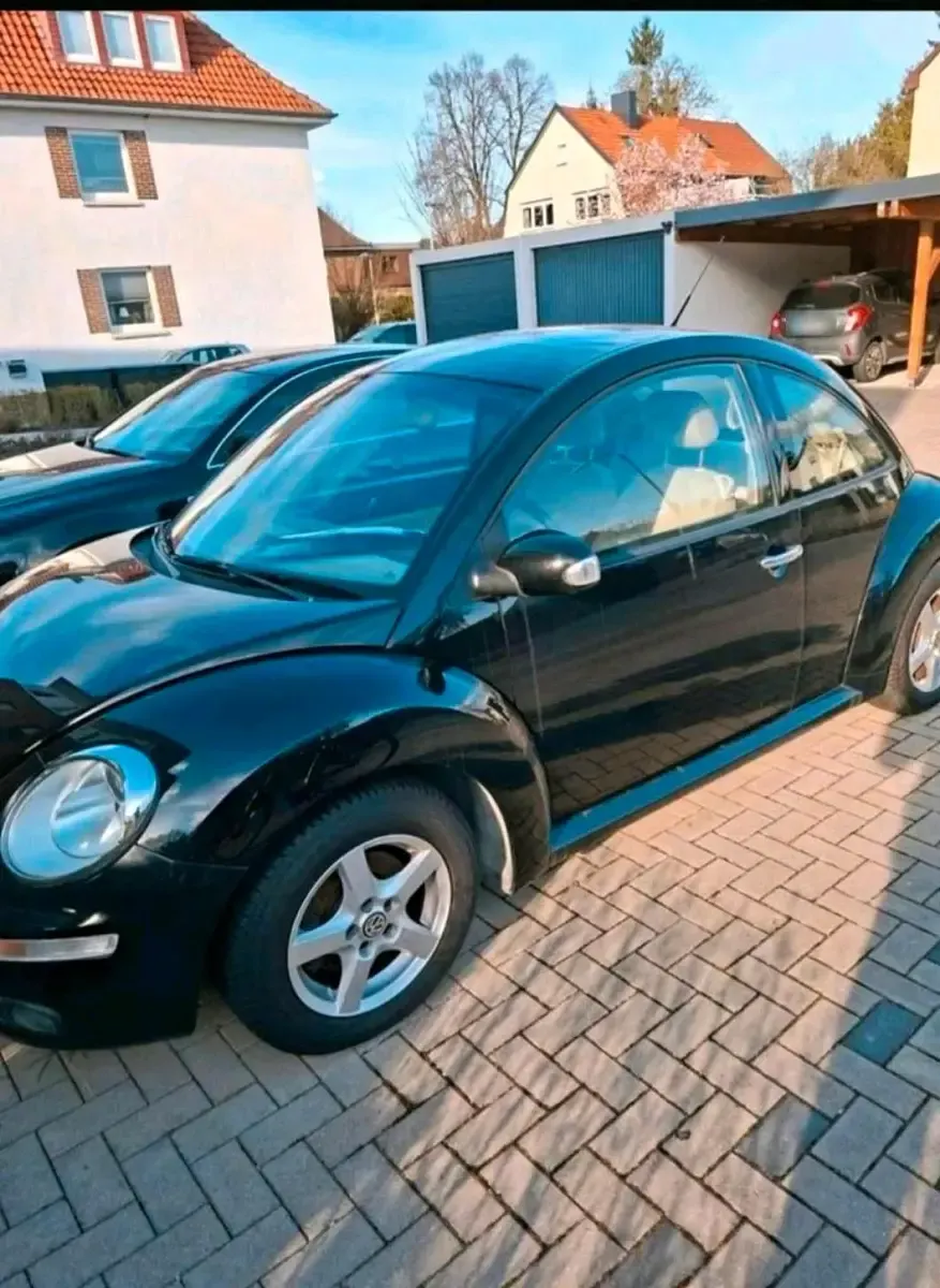 Gebraucht VW New Beetle 116 PS (85 kW) 2005 Schwarz Kleinwagen