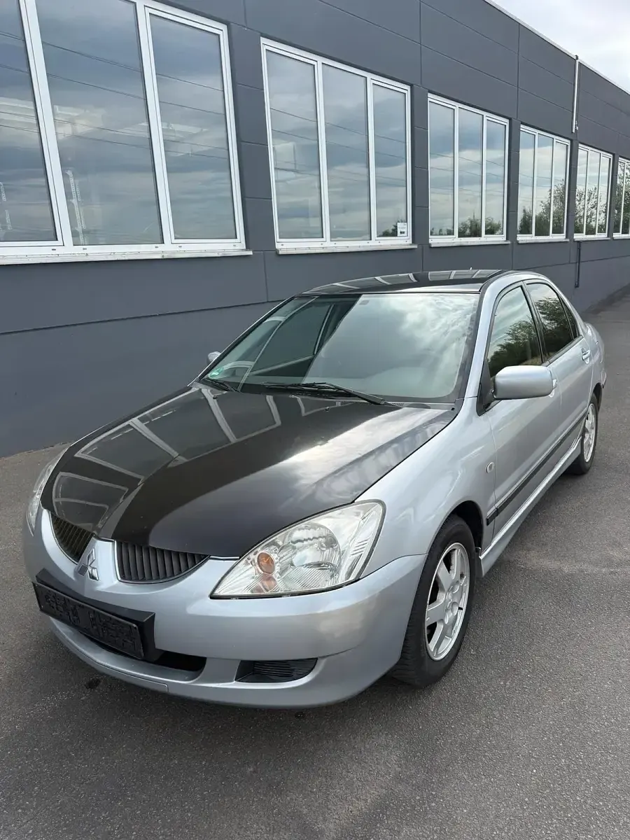 Gebraucht Mitsubishi Lancer 98 PS (72 kW) 2004 Silber Limousine