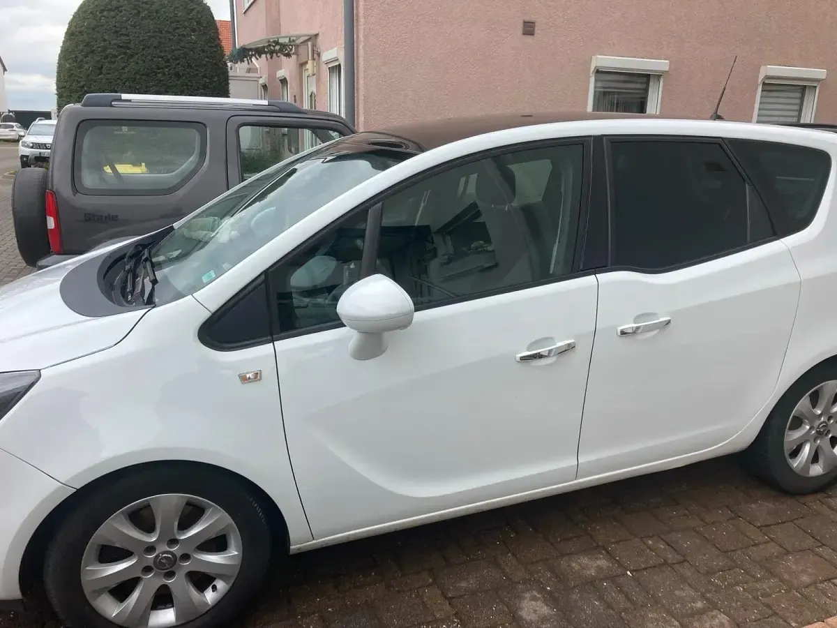 Używany Opel Meriva 140 KM (102 kW) 2013 Biały Minivan