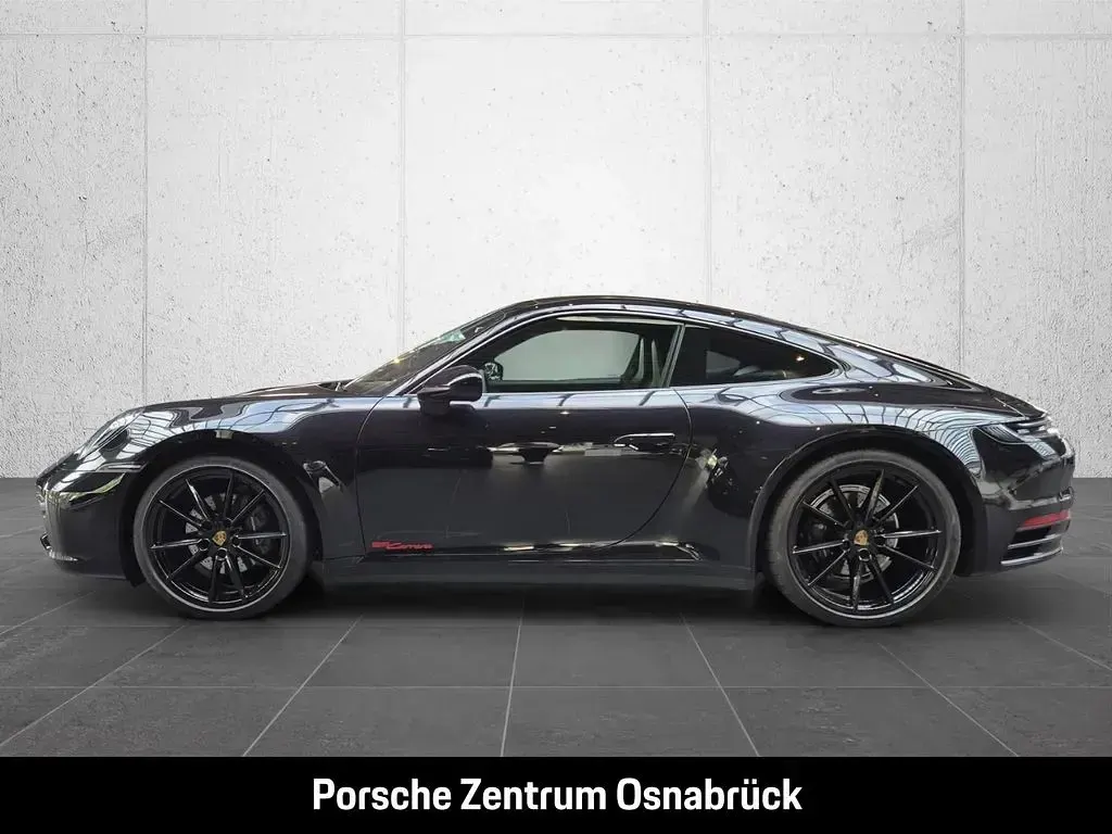 Gebraucht Porsche 911 Carrera 385 PS (283 kW) 2020 Tiefschwarzmetallic Coupé