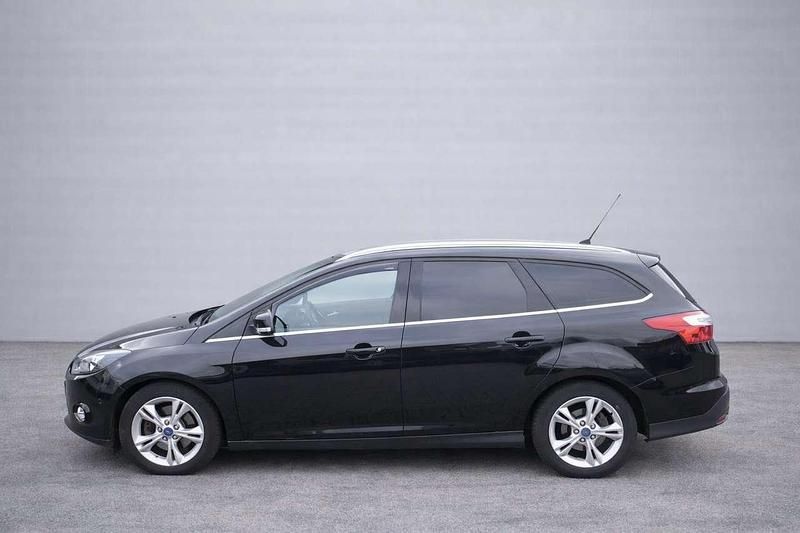 Gebraucht Ford Focus Champions Edition 125 PS (91 kW) 2013 Pantherschwarz metallic Kombi