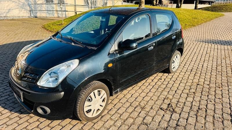 Gebraucht Nissan Pixo 65 PS (47 kW) 2011 Schwarz Kleinwagen