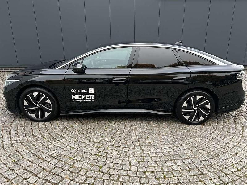 Gebraucht VW ID.7 Pro 210 kW (286 PS) 2023 Grenadillschwarz metallic Kleinwagen