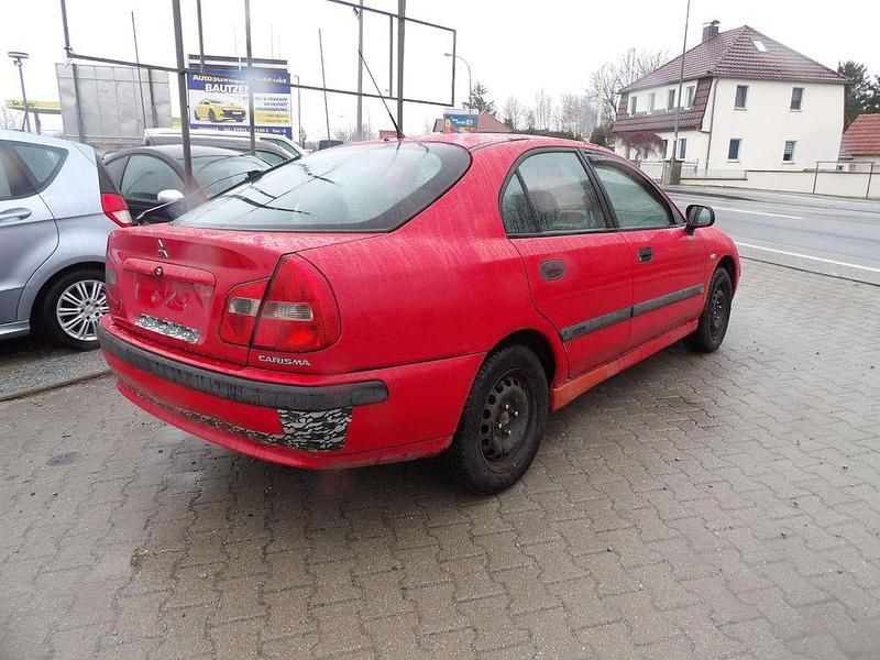 Gebraucht Mitsubishi Carisma 99 PS (72 kW) 2002 Rot Limousine