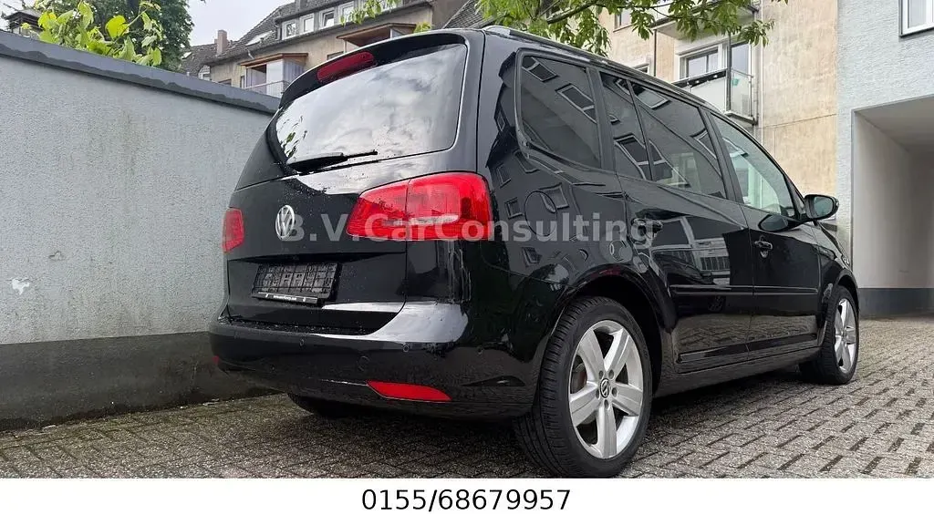 Gebraucht VW Touran Cup 105 PS (77 kW) 2014 Schwarz Van / Kleinbus