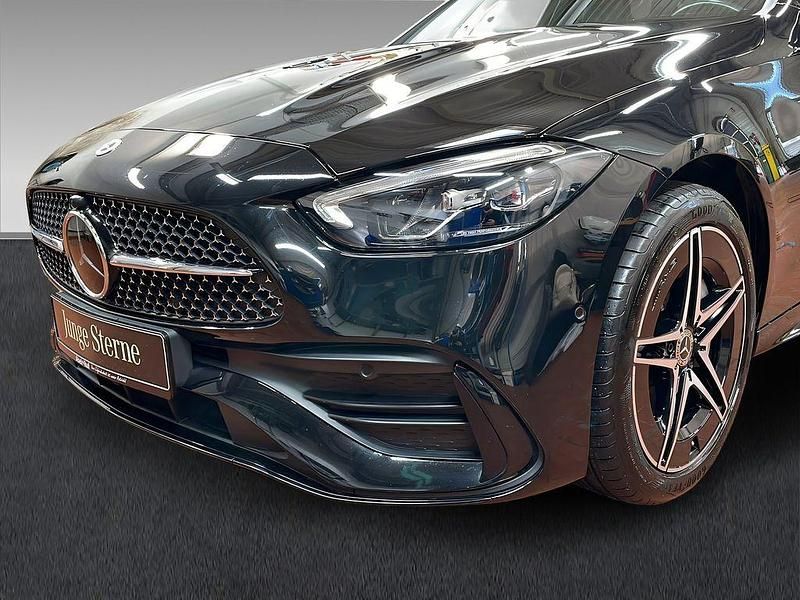 Gebraucht Mercedes C300e AMG 313 PS (230 kW) 2023 Lack obsidianschwarz Kombi