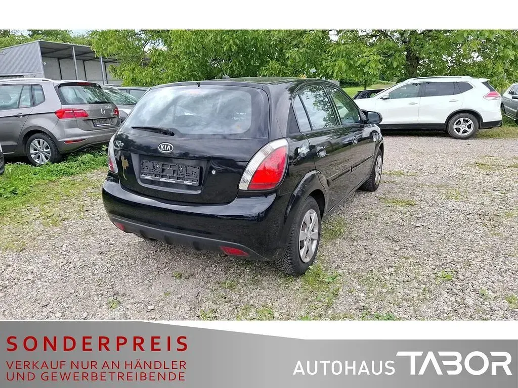 Używany Kia Rio Vision 97 KM (71 kW) 2011 Czarny Sedan/Limuzyna