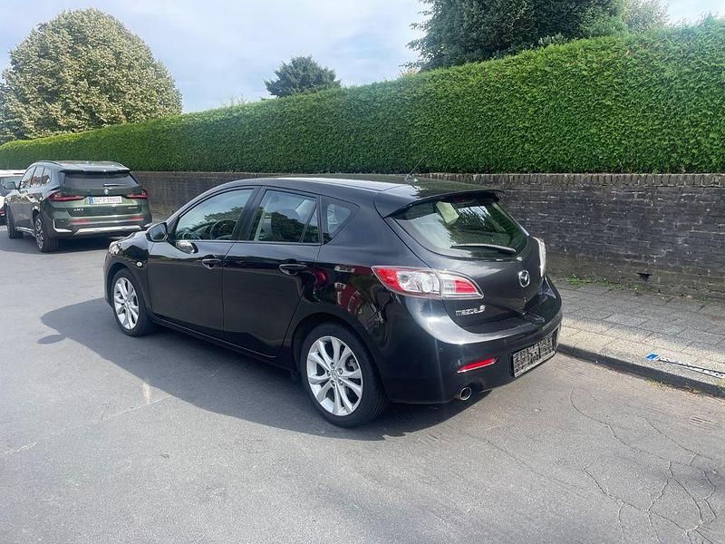 Schwarz Gebraucht 2011 Mazda 3 Edition Limousine | 5.555 € (Fairer Preis) - Bild 1/4